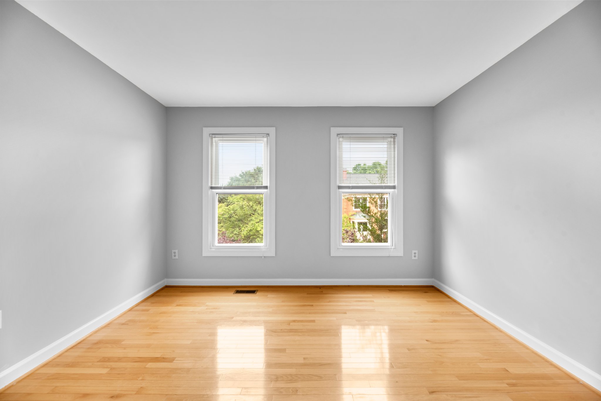 Guest Bedroom offers hardwood floors and new Andersen Windows