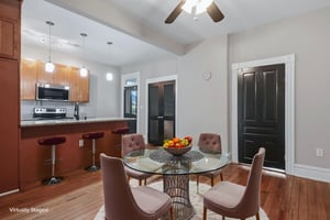 25-Unit 1 Kitchen virtually staged.jpeg