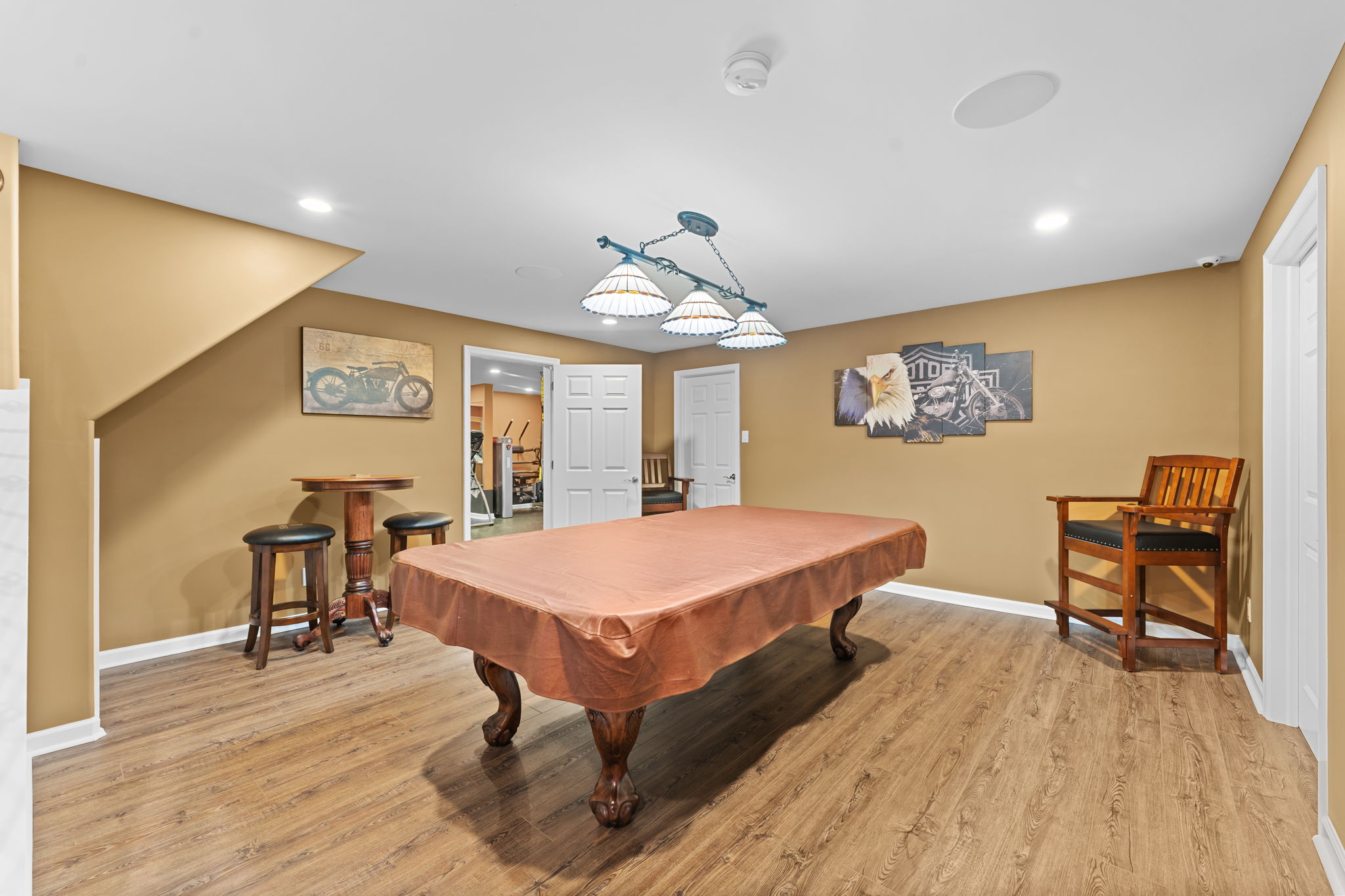 Pool Room in Finished Basement (Open to Bar Area)