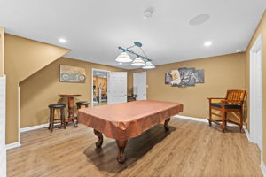 Pool Room in Finished Basement (Open to Bar Area)