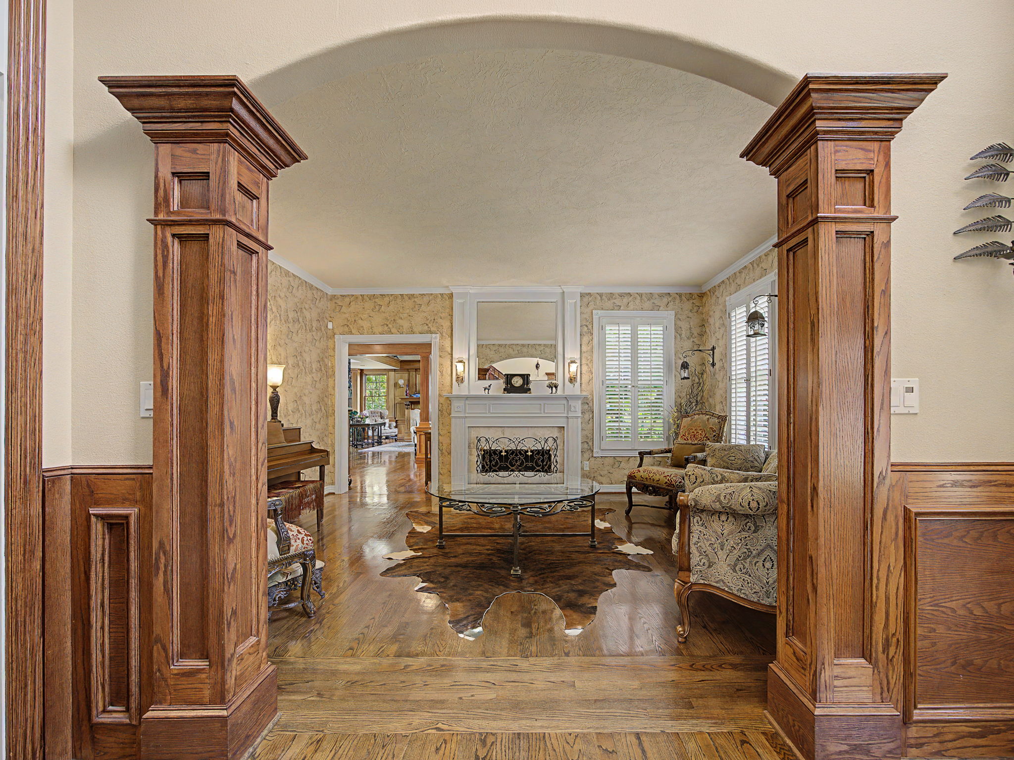 Formal Living area with gas fireplace off main Foyer