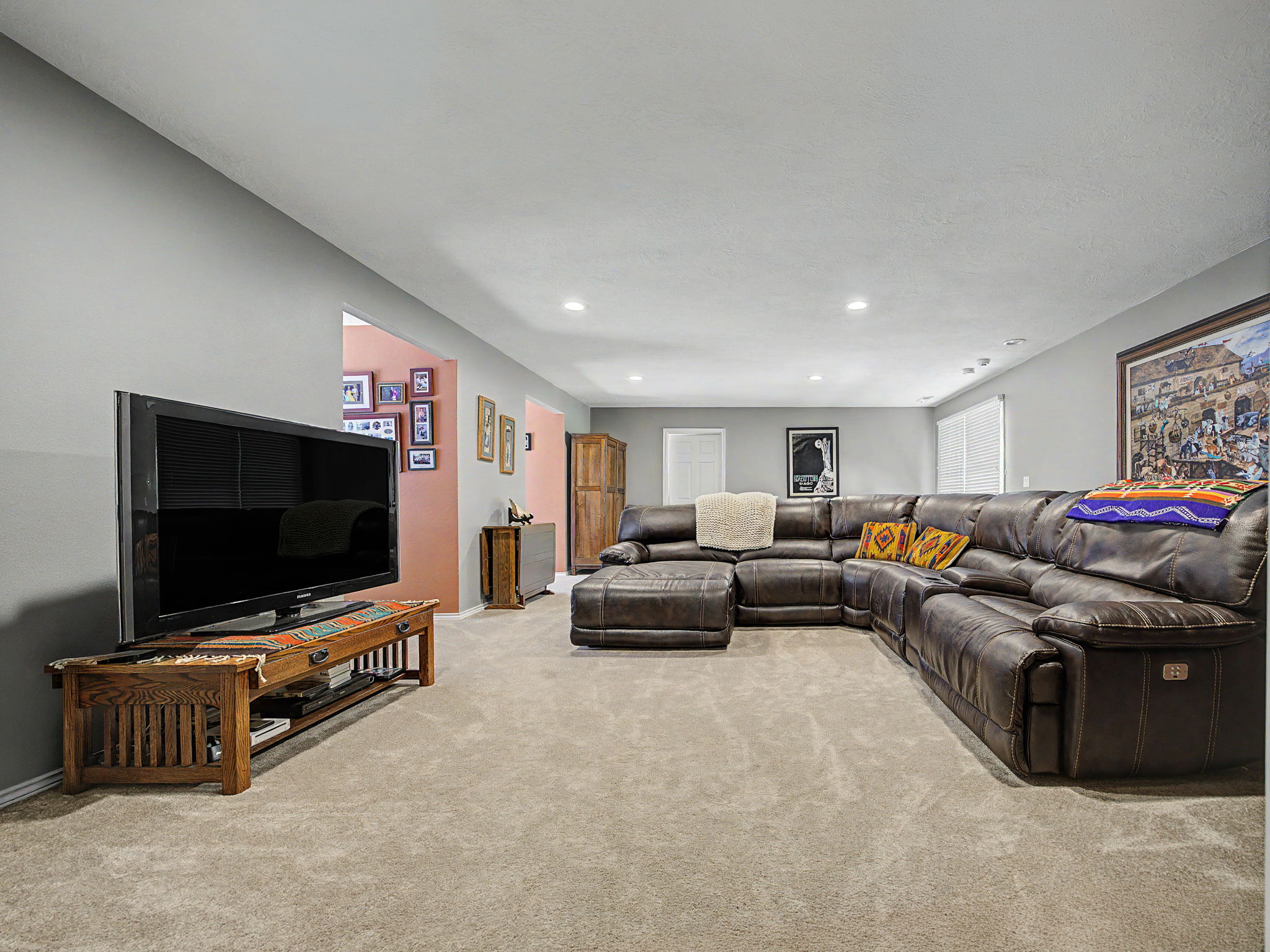 Great room has two Window dormer seats, carpeting
