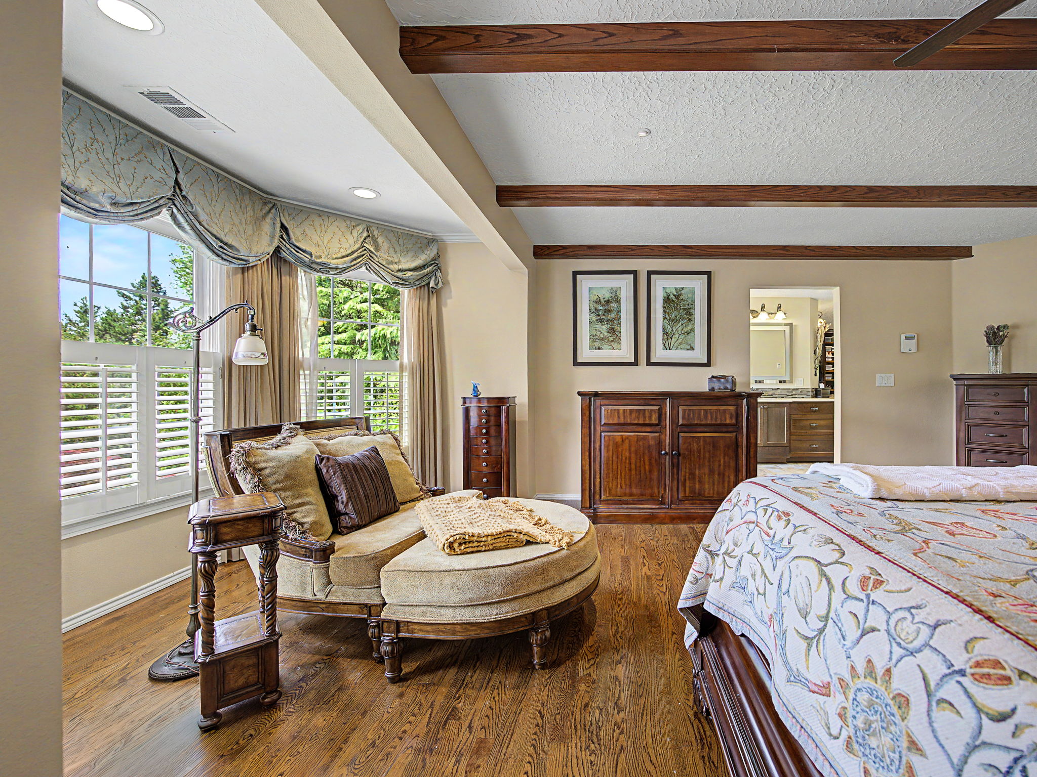 Primary bedroom suite with windows & darkening curtains