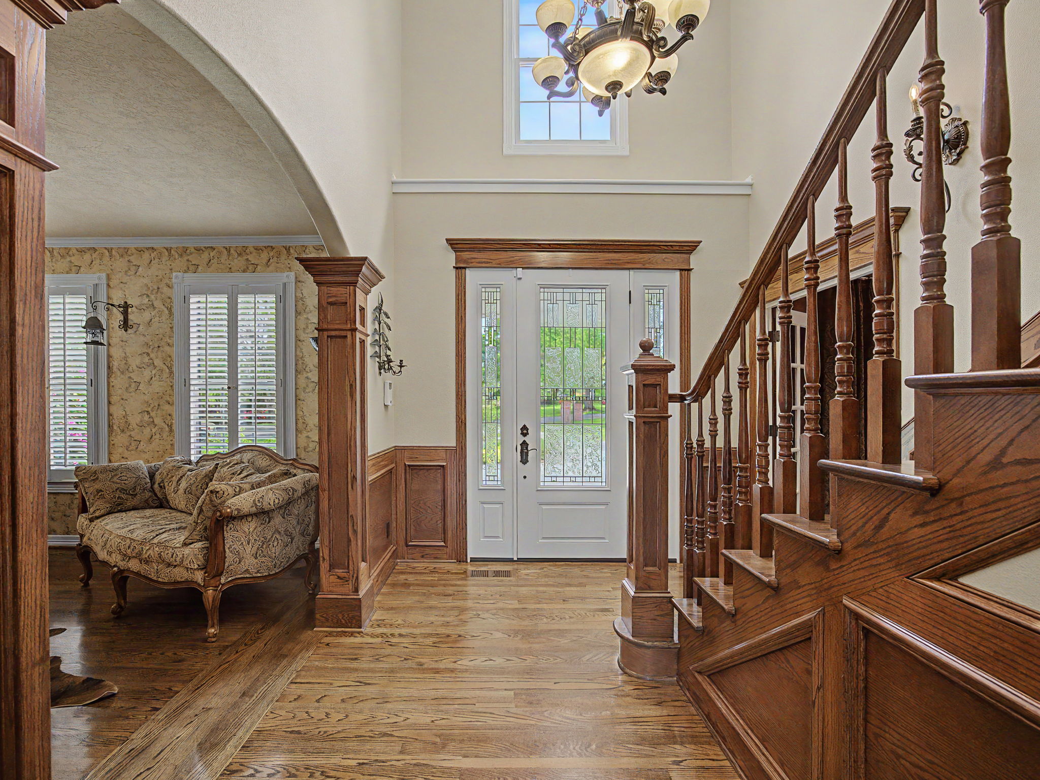 Two story Entry Foyer - stained glass door