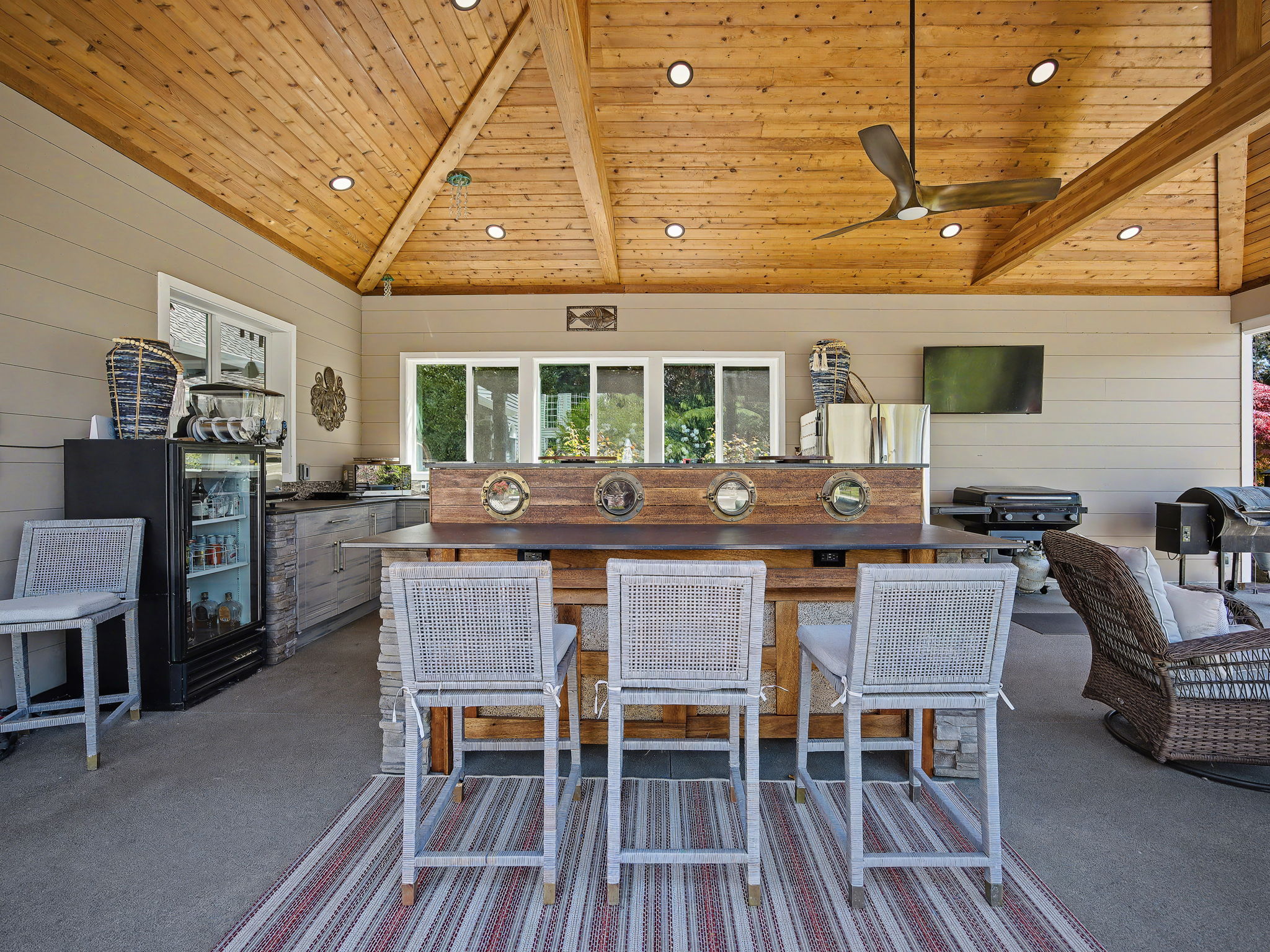 Outdoor Kitchen has Marine wood, brass port holes