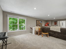 Great room - Staircase to lower level - Upper floor