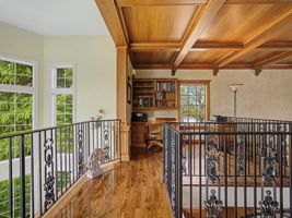 Loft has built in desks on each end, Circular staircase