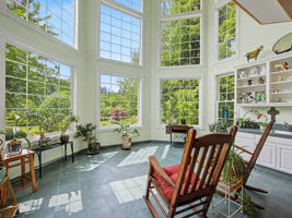 Sunroom just off the Library - Wall of windows - Main floor