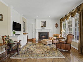 Cozy Family room with built-ins and Cozy gas fireplace