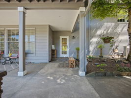 An entry door to back stairs, Family room or Laundry