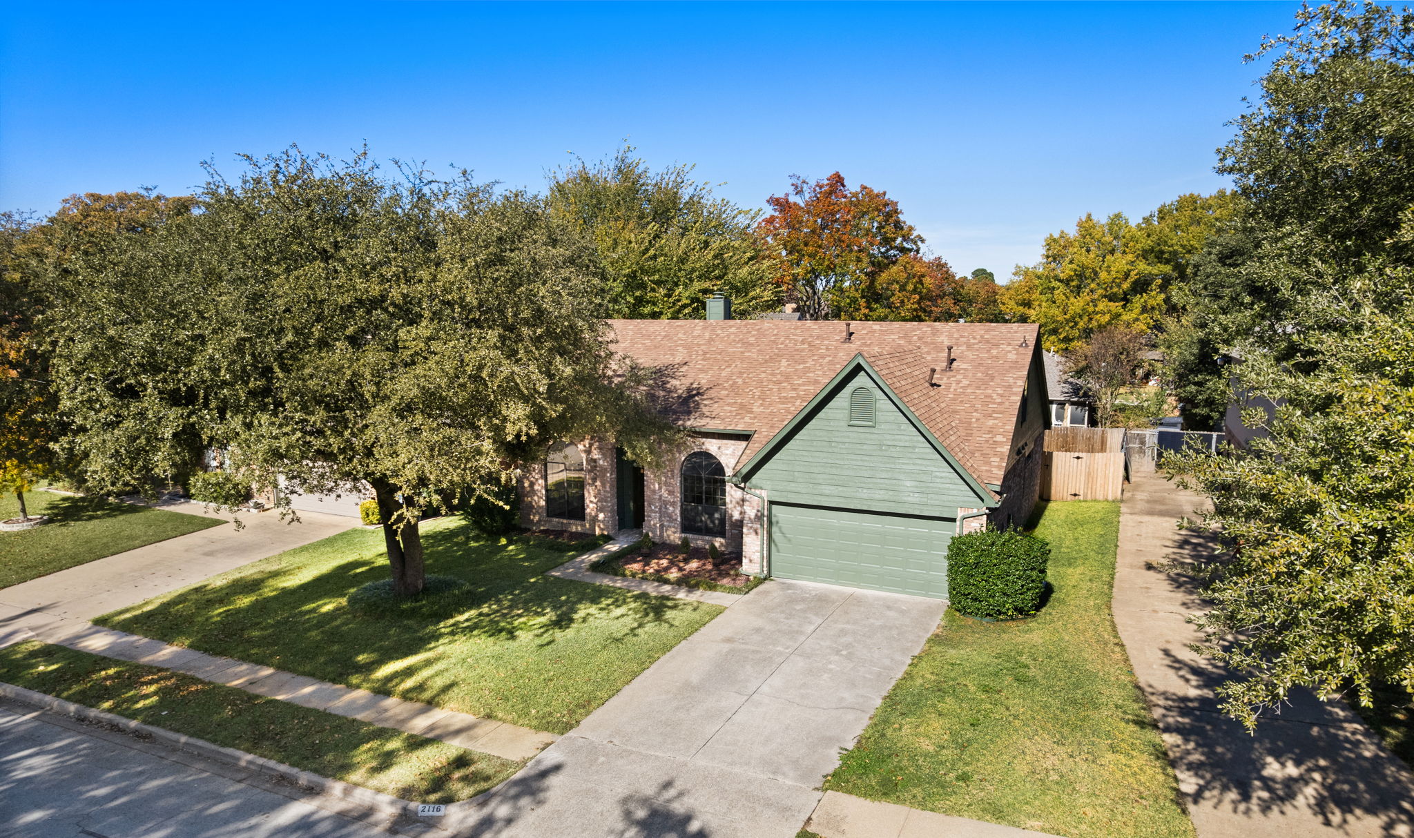 WOW! Don't let this curb view fool you!  Almost 2,600 square feet in a beautifully designed two-story home that offers the curb appeal and convenience of a single-story house.
