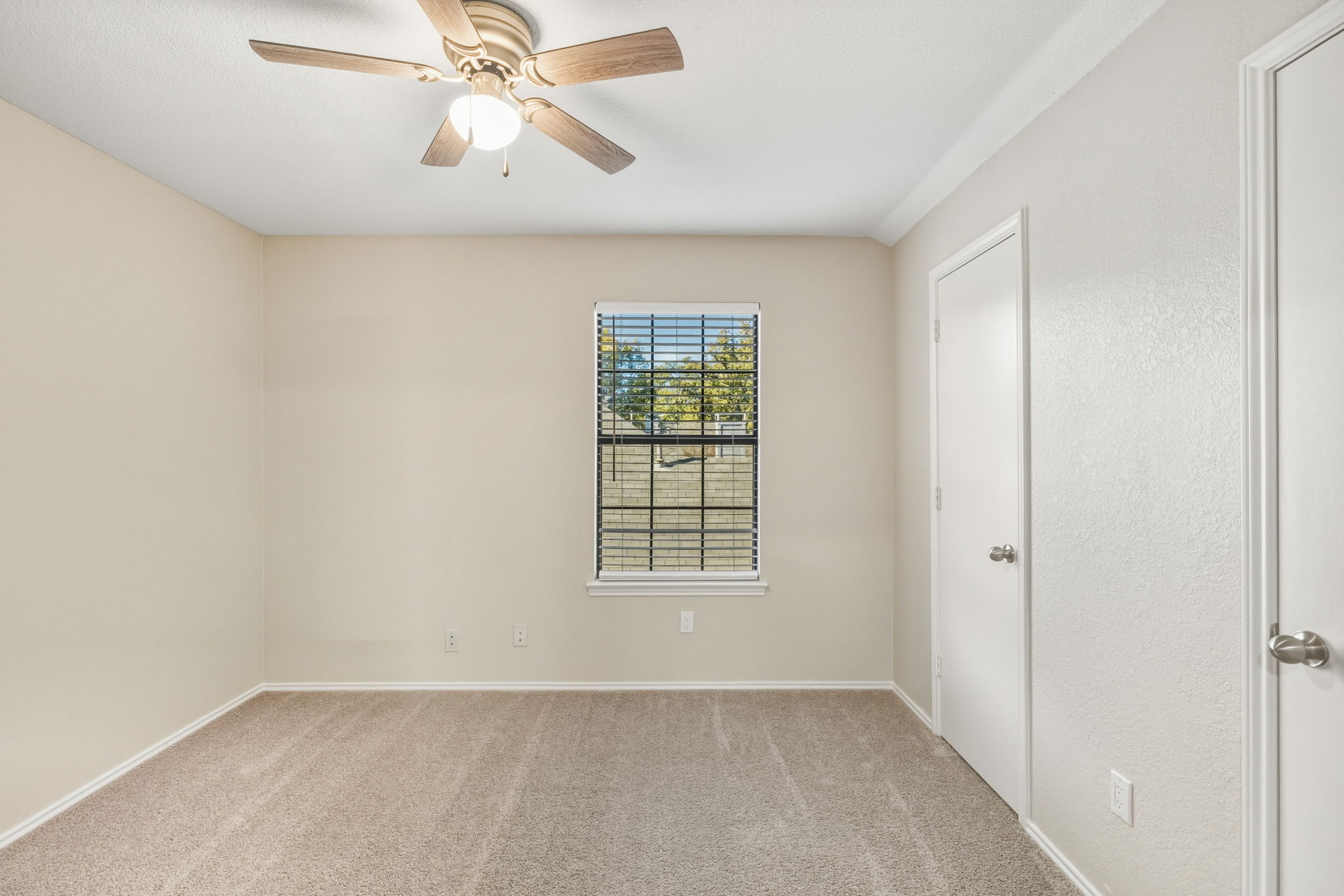 Bedroom #3 offers a generously sized closet with dual doors for easy access.