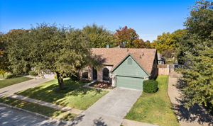 WOW! Don't let this curb view fool you!  Almost 2,600 square feet in a beautifully designed two-story home that offers the curb appeal and convenience of a single-story house.