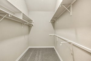 Large Walk-in Master Closet with New Carpet