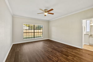 First Floor Master Bedroom Suite with 8' Wide Window and En Suite off to the Right.