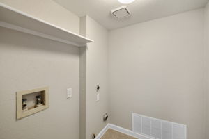 Large Laundry Room - Equipped With Laundry Shoot Behind The Door (unseen in this photo)