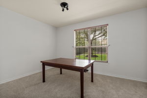 Downstairs flex room that could easily be converted into a 6th bedroom and right across from the half bath that could be converted to a full bath