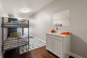 Bunk Room with convenient sink.