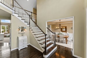 Elegant Foyer with Sweeping Staircase