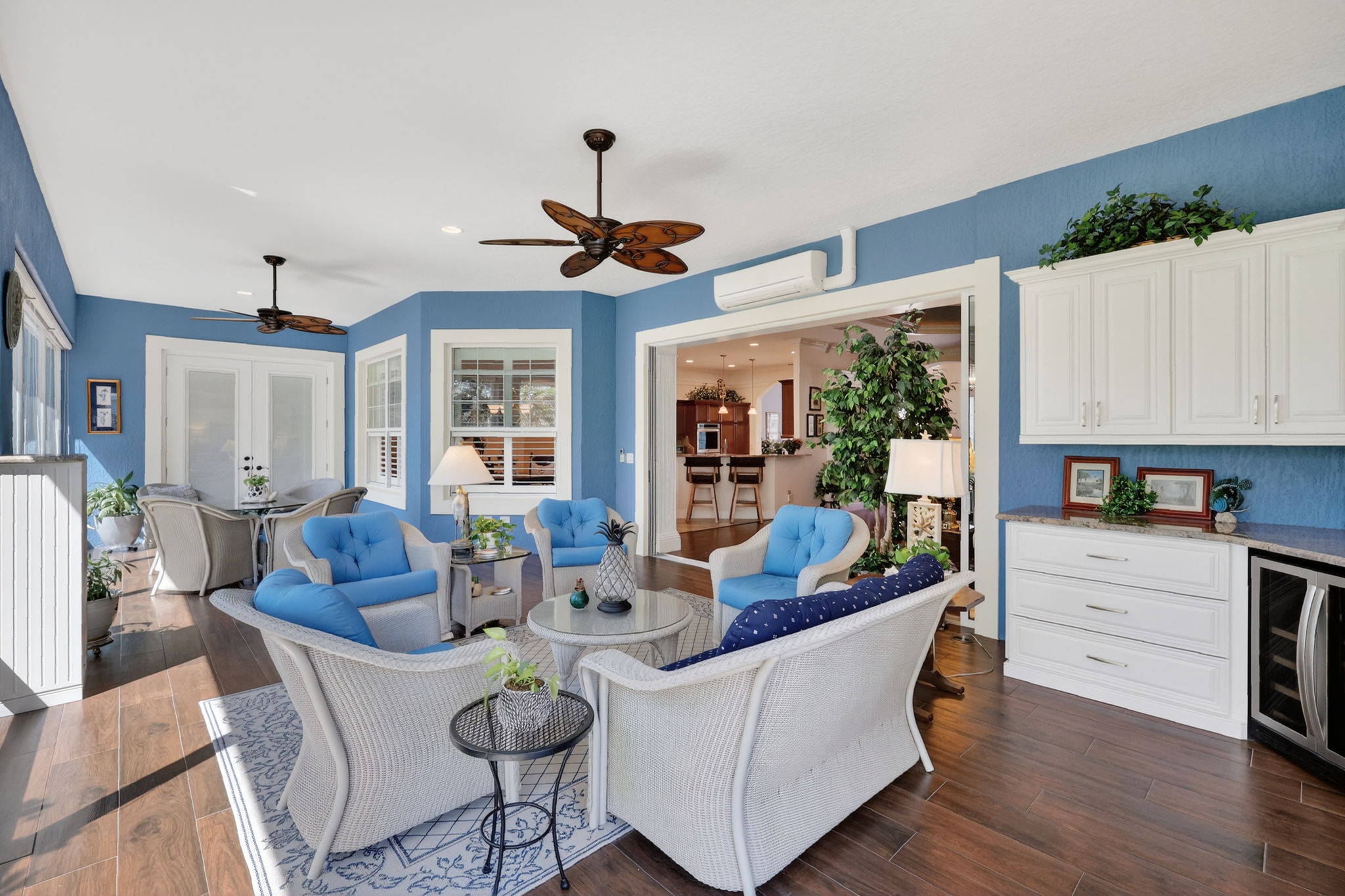 Expansive Florida Room with Built-In Cabinetry