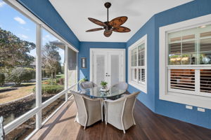 Expansive Florida Room with Privacy Landscaping