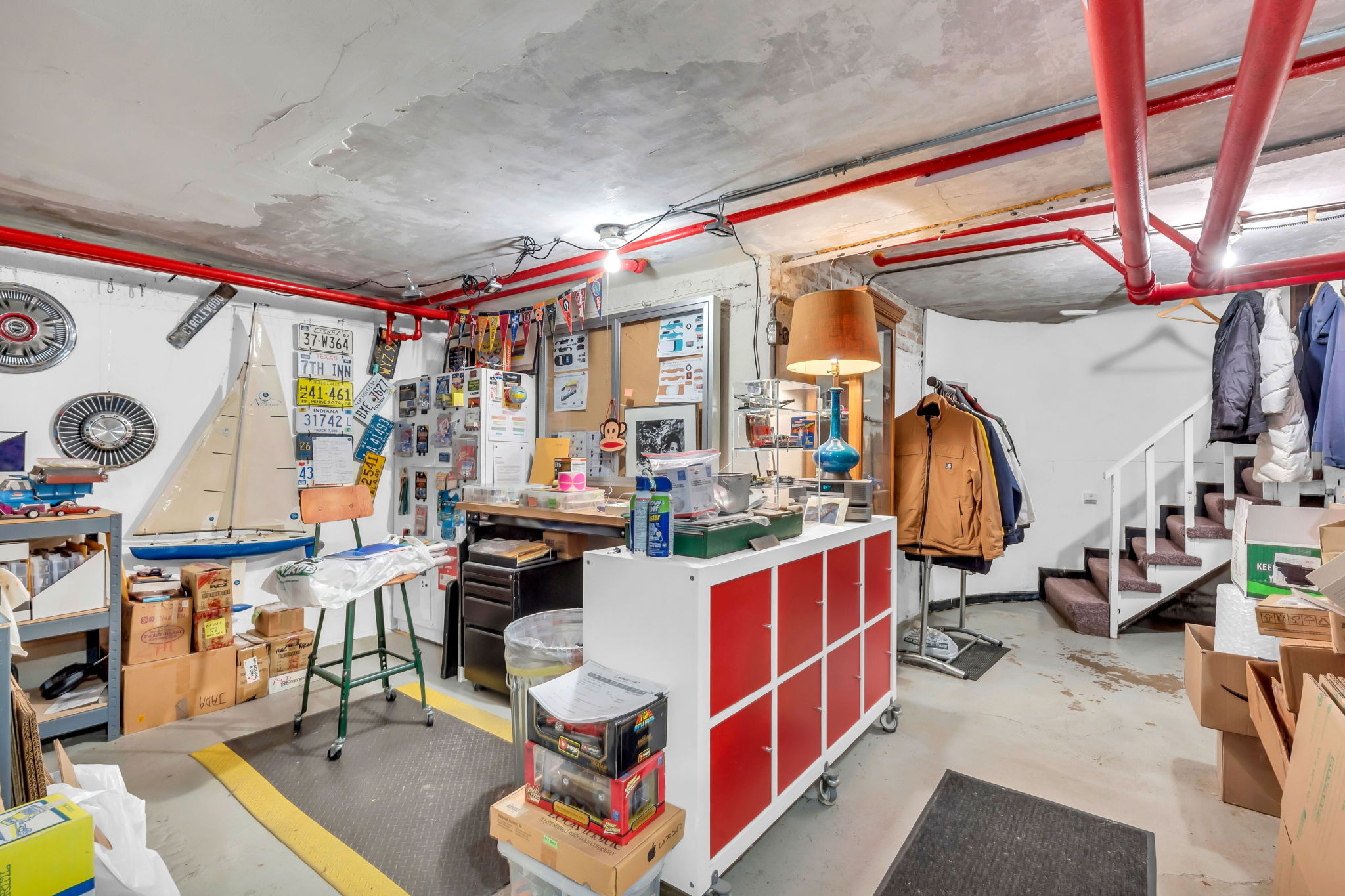 Full unfinished basement with laundry and tons of storage space