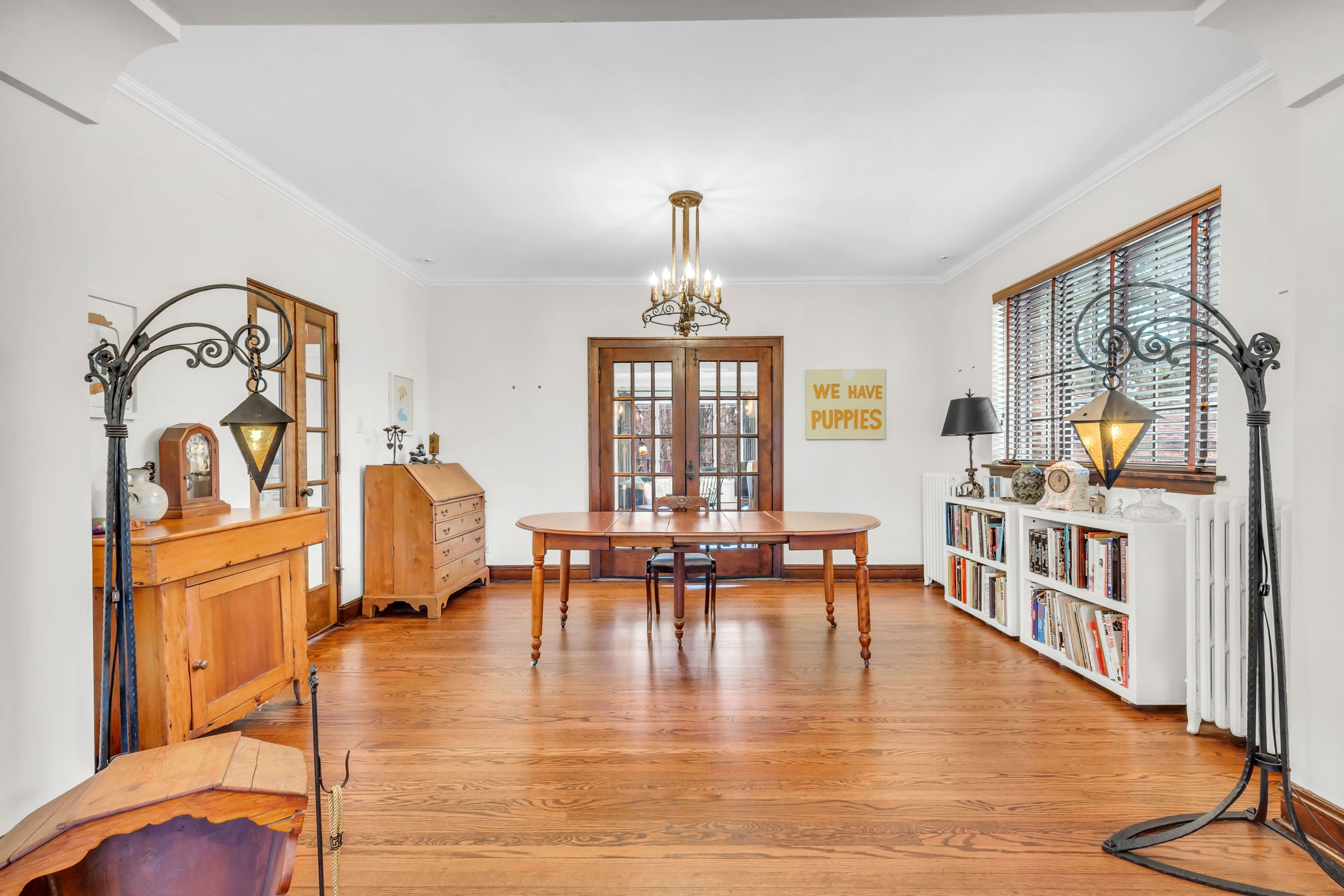Generous dining room flanked by French doors