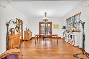 Generous dining room flanked by French doors