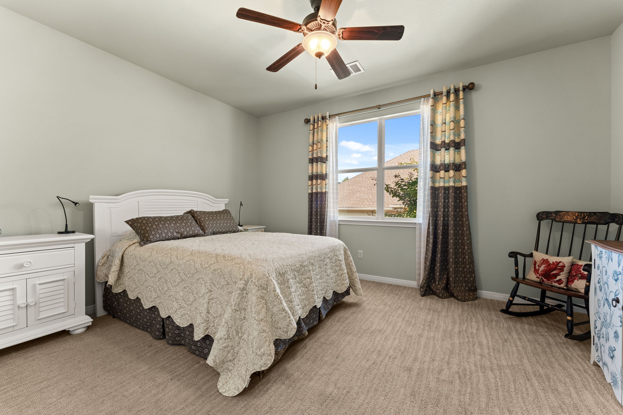 Upstairs bedroom #3 has carpet and custom closet