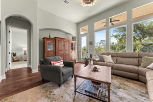 A wall of windows let in gorgeous natural light and treetop views of the Preserve