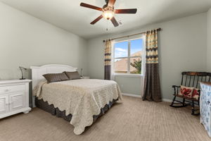 Upstairs bedroom #3 has carpet and custom closet