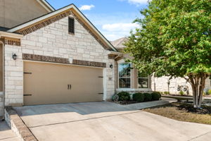 2 car garage + 2 spots in the driveway allow for ample guest parking