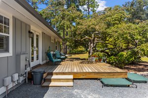 Main house rear entrance with deck