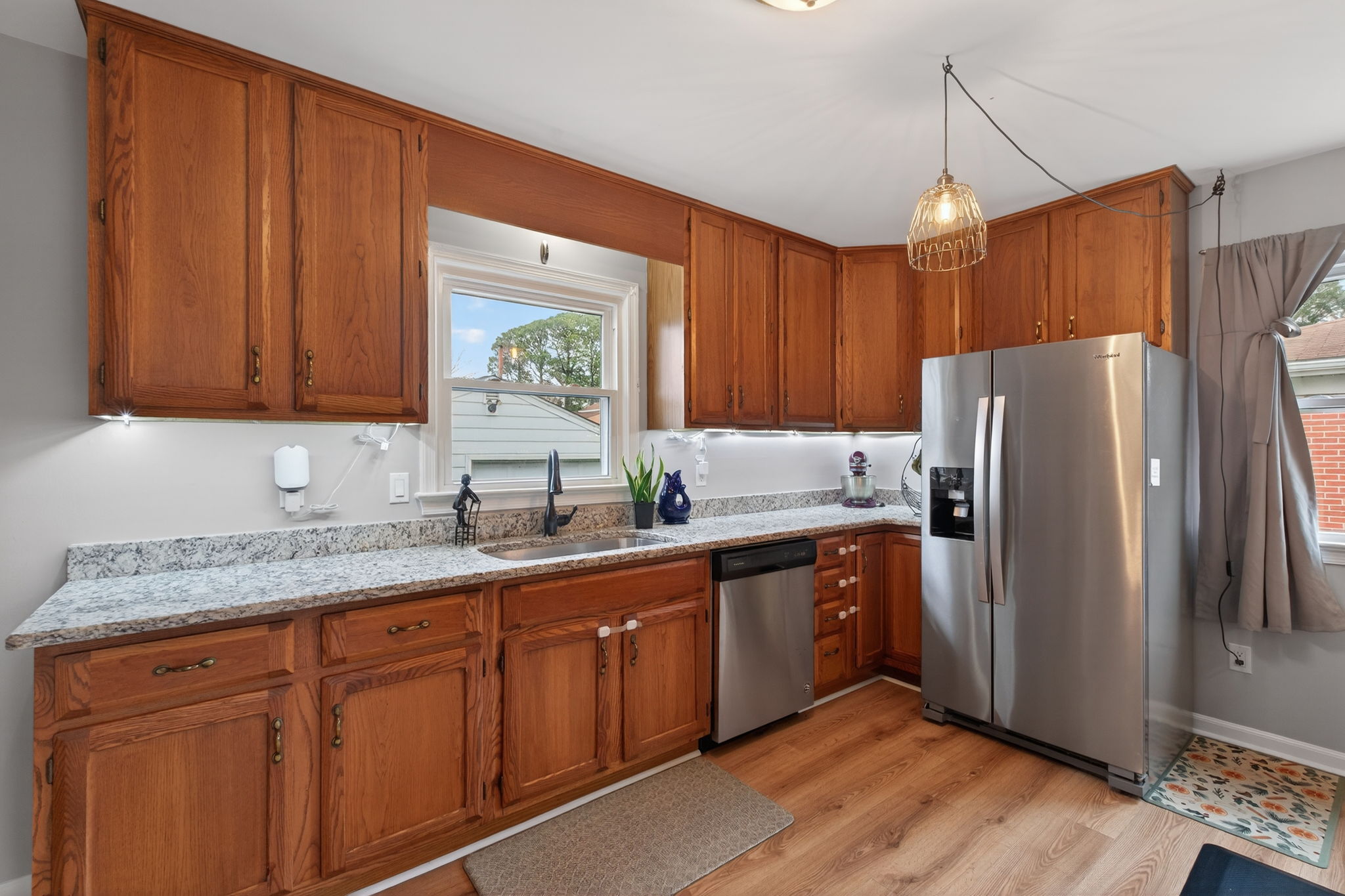 Updated kitchen with stainless steel appliances.