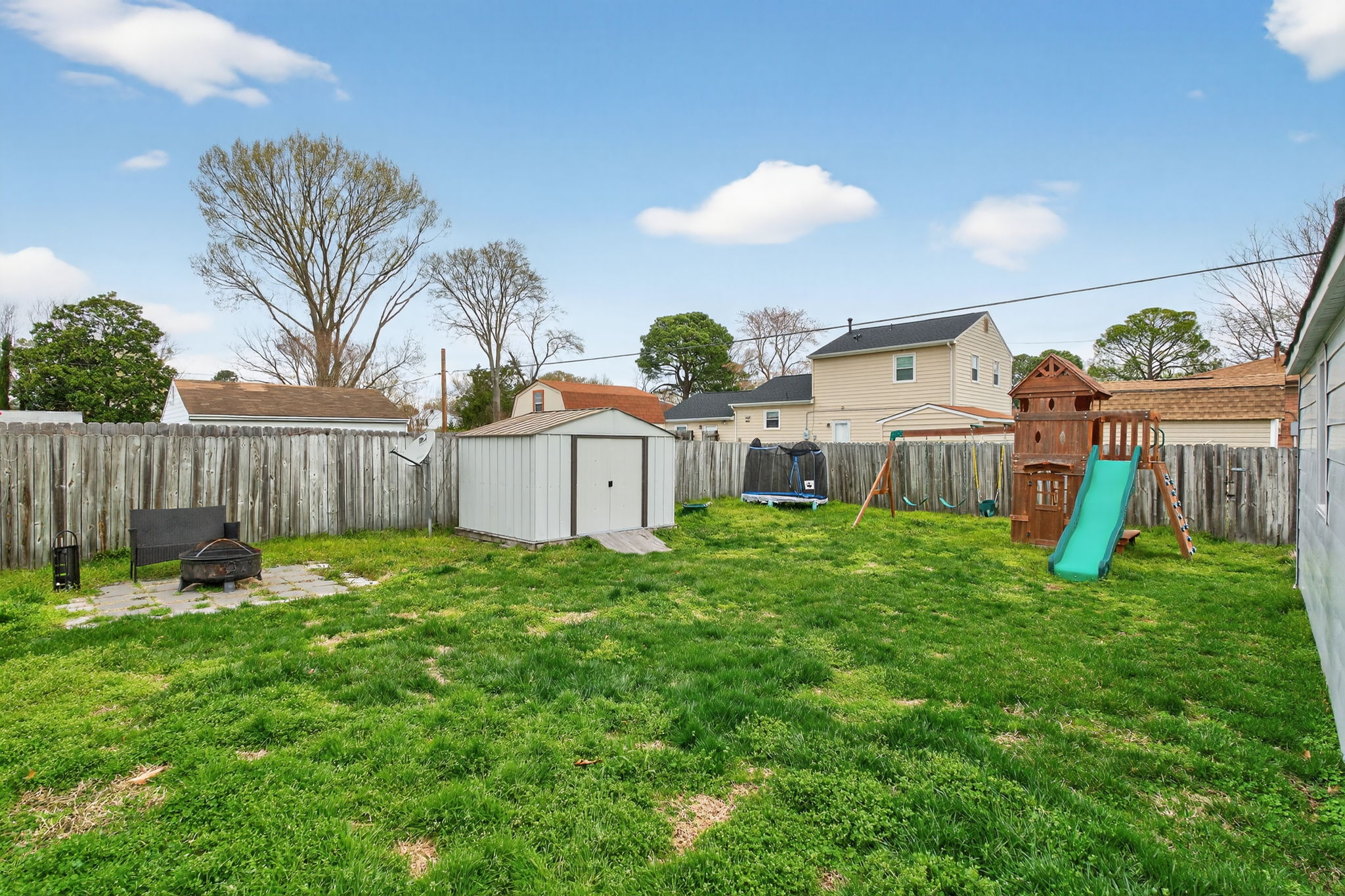 Spacious fenced yard for entertaining.