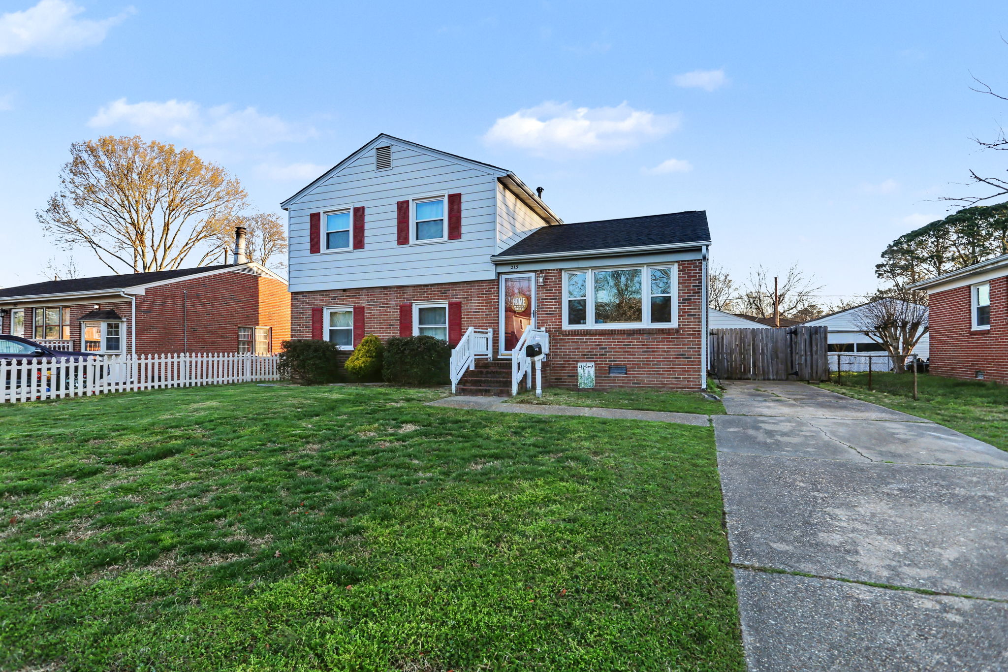 Inviting curb appeal with spacious driveway.