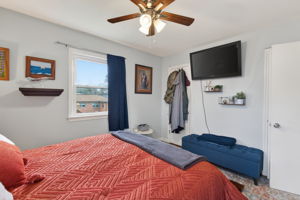 Full-size Primary Bedroom Walk-in Closet.
