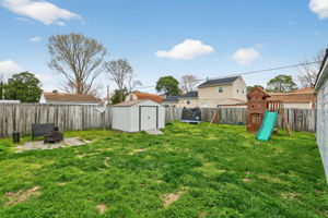 Spacious fenced yard for entertaining.