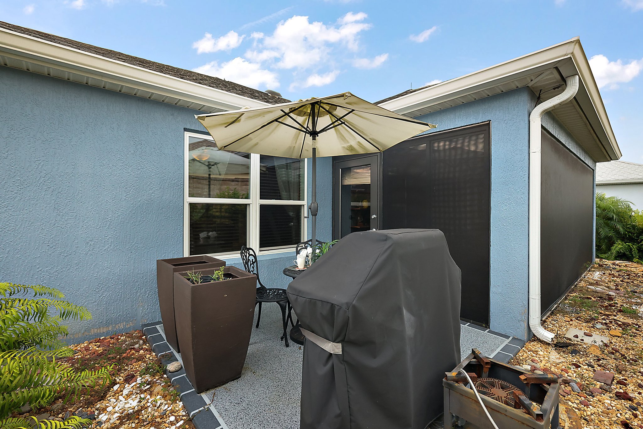 Rear Patio with Privacy Landscaping and Wall