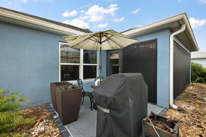 Rear Patio with Privacy Landscaping and Wall
