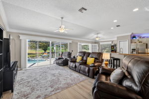Living Room withSwimming Pool and Golf Front Views