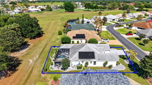 Aerial Side Elevation with Property Lines and Sweeping Golf Front Views!