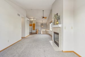 Living Room to the dining area, Kitchen and Entry.