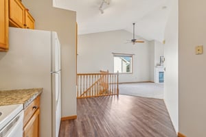 Kitchen to the entry way and Dining Area.