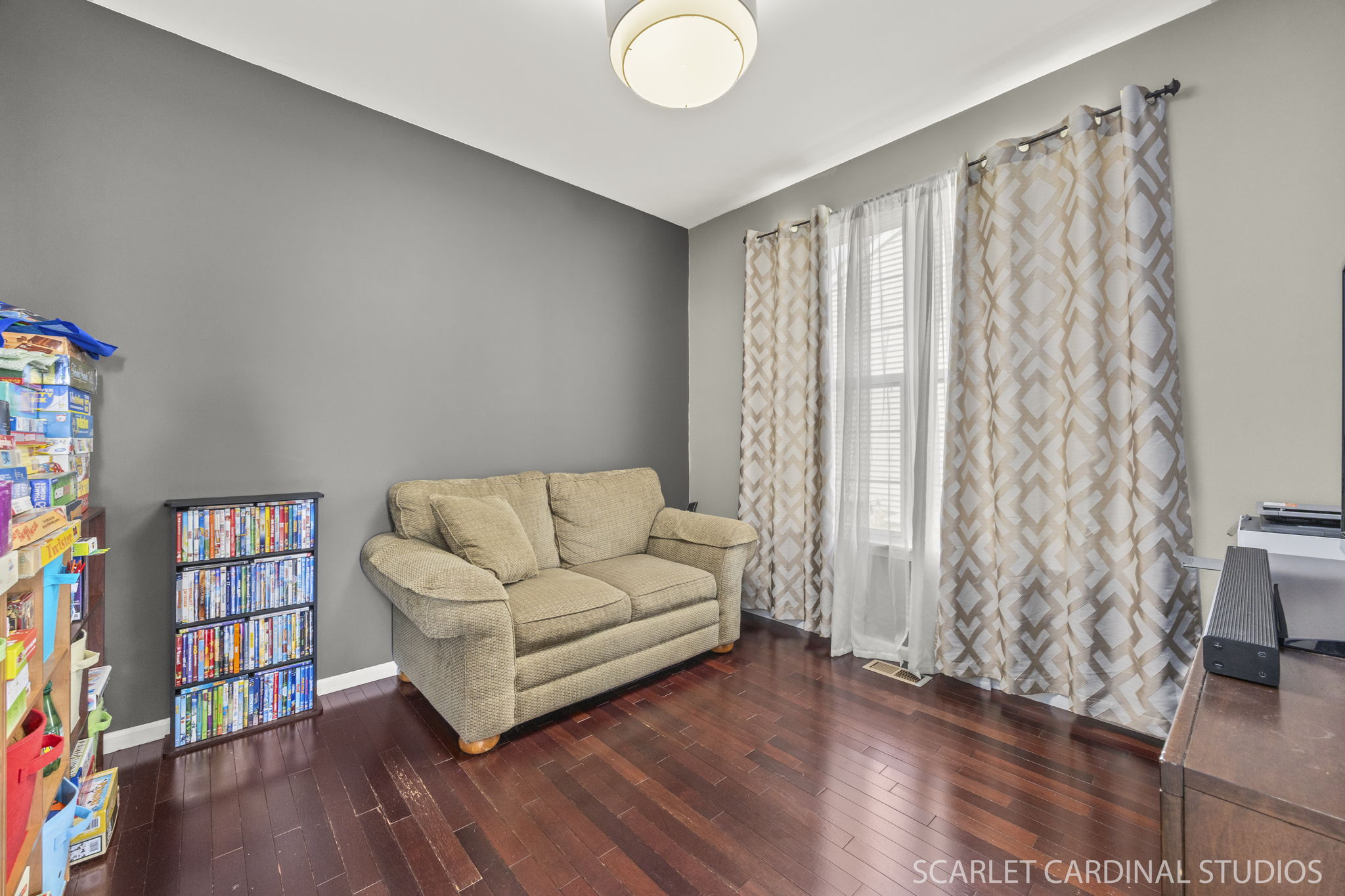Versatile first-floor den—perfect for a home office, playroom, or extra bedroom
