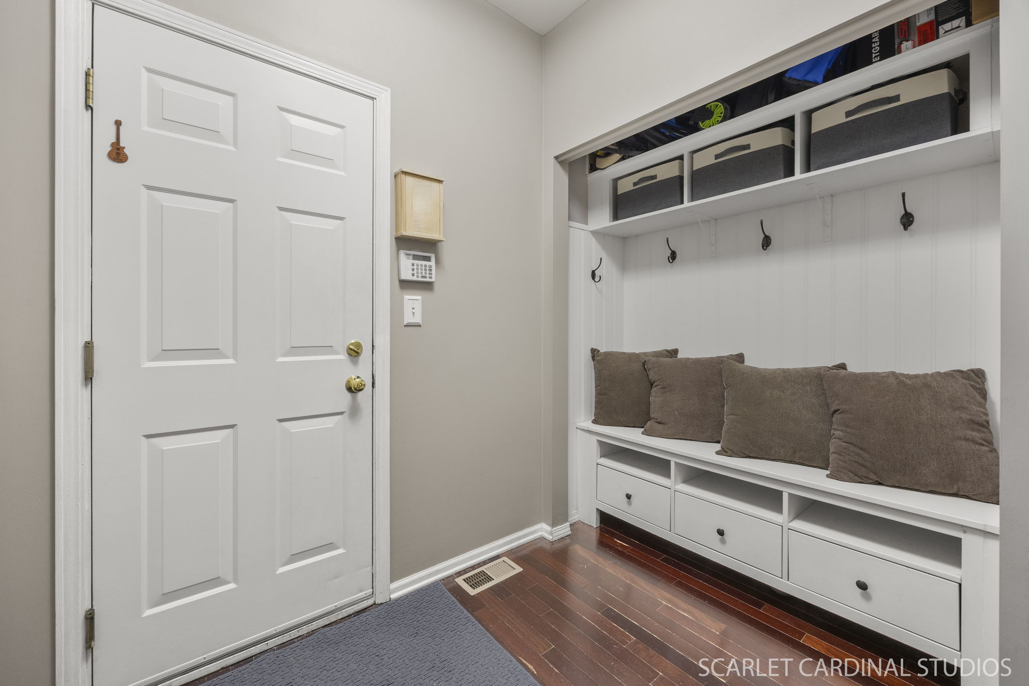 Well-designed mudroom with built-in bench and abundant smart storage