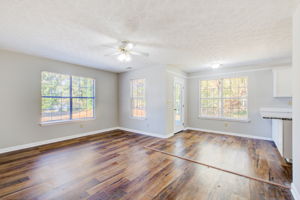 10 Family Room w Breakfast Area + Patio Walkout