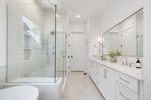 Primary bathroom shower includes a Rain Shower Head