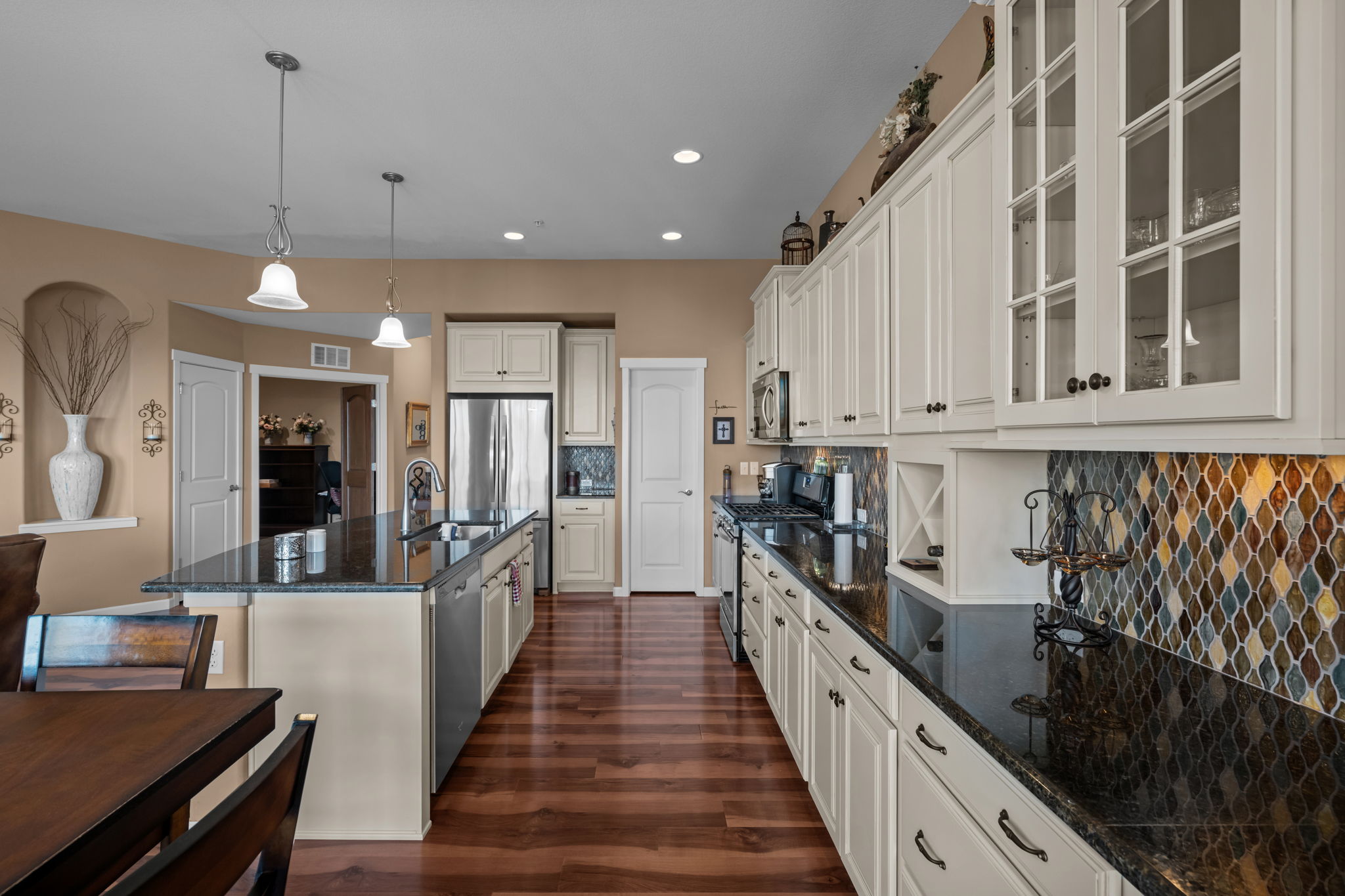 Kitchen looking back towards foyer and study/guest bedroom
