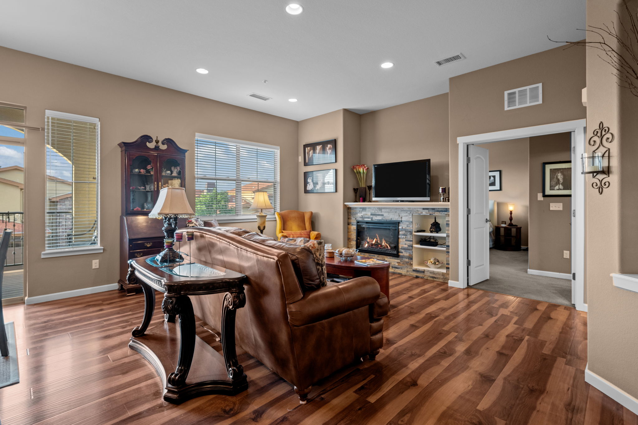View from kitchen into Family Room and Primary Bedroom